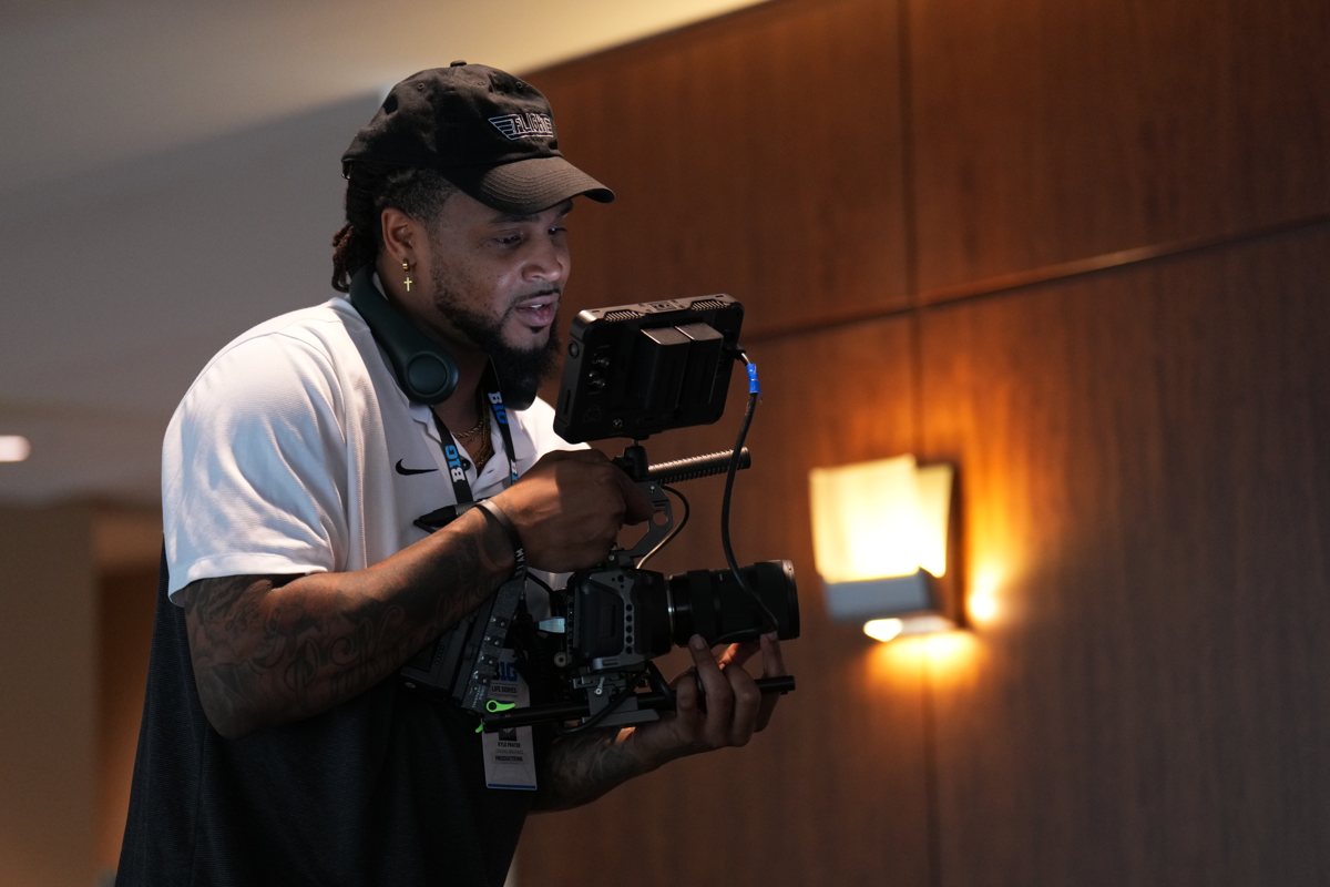 Kyle Prater operating the camera on set